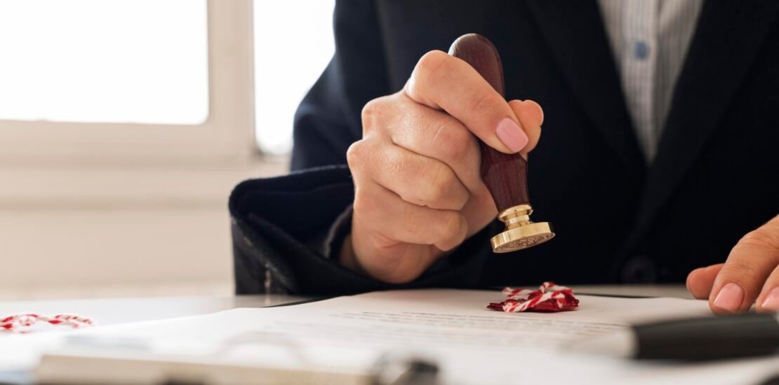person-using-wax-seal-certificate-2-scaled